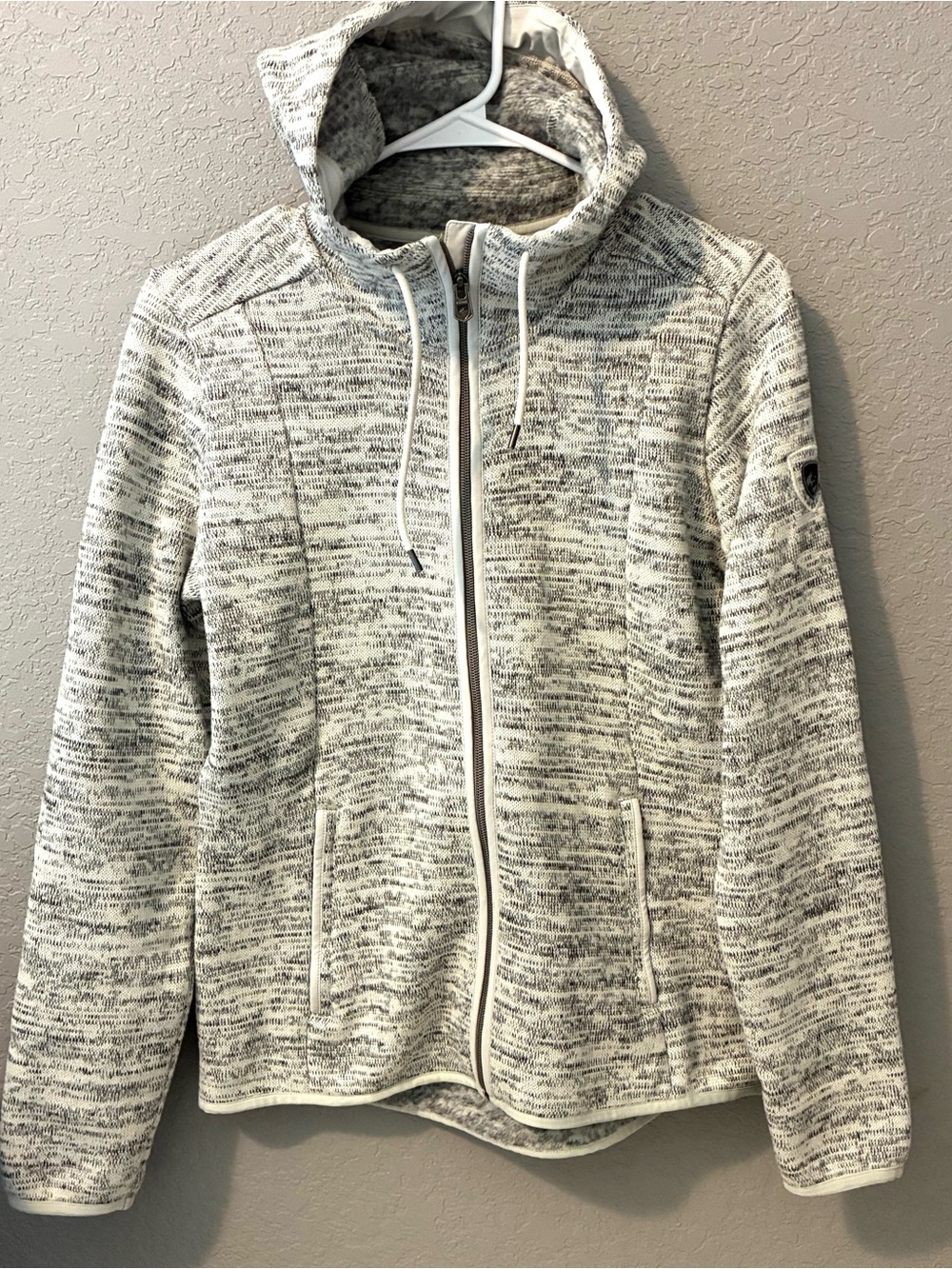 Kuhl Women's Light Heathered Zip Hoodie in White and Gray